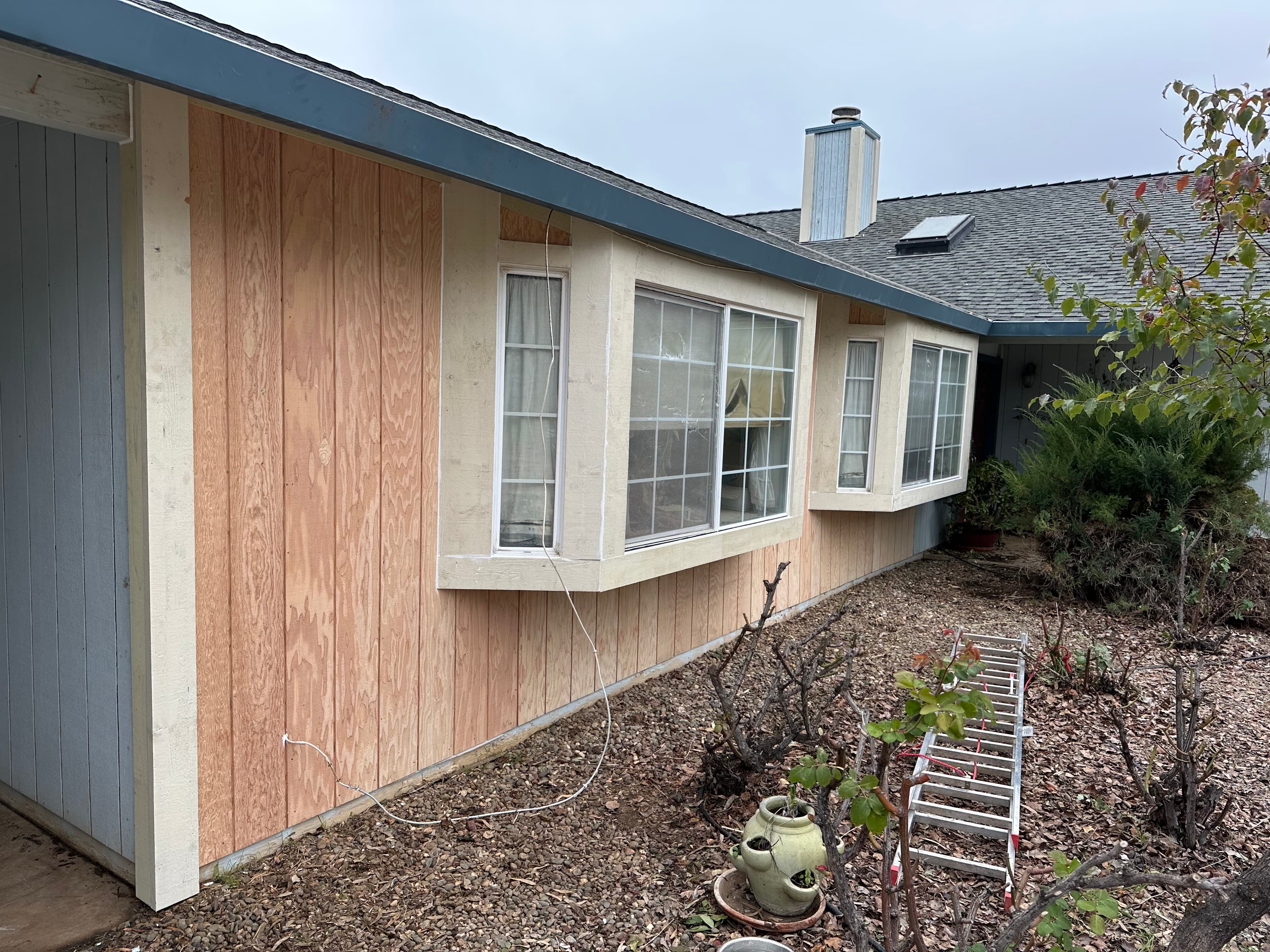 Board and batten siding repanel on residential home in Roseville, CA by NorCal Exteriors